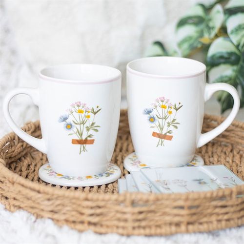 if mums were flowers I'd pick you mug and coaster set. White background with a bunch of pretty flowers design 